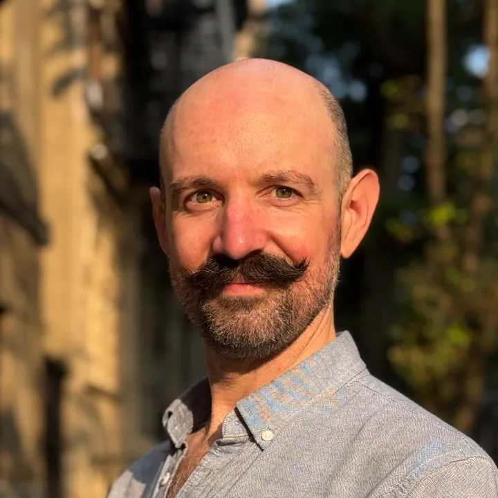 Parker Bossier on a New York City street at golden hour